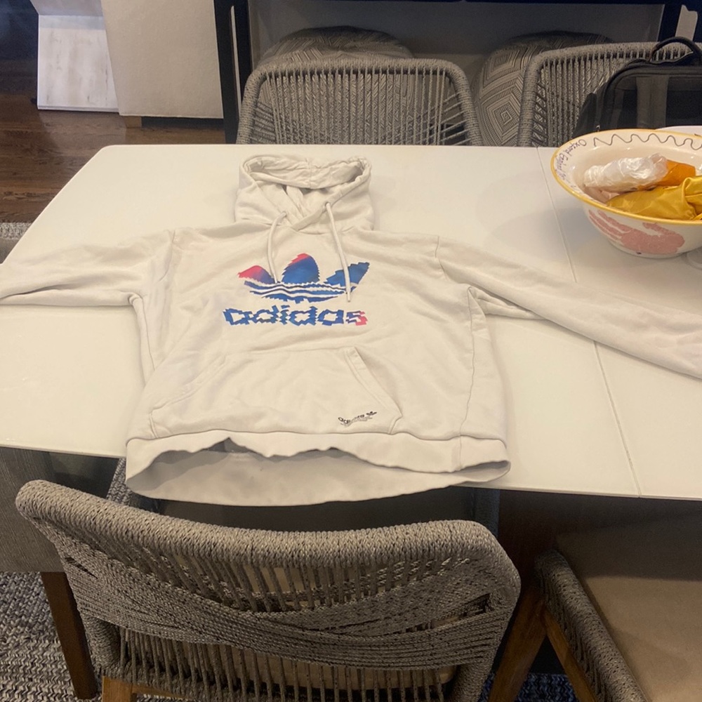 I’m selling a white adidas sweatshirt
